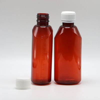 Récipient de médicaments liquides en PET de pharmacie ovale ambrée de 200 ml avec couvercle et échelle