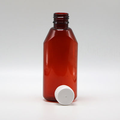 Récipient de médicaments liquides en PET de pharmacie ovale ambrée de 200 ml avec couvercle et échelle