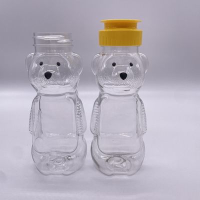 Bouteille de boissons en plastique en forme d'ours de qualité alimentaire de 200 ml avec bouchon à vis en aluminium