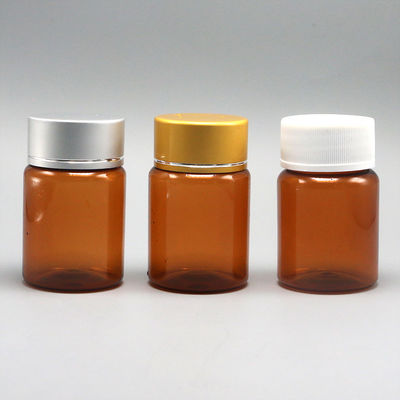 Pilule PET ambrée rechargeable de 60 ml Capsule Bouteille d' huile de poisson avec bouchon à vis en aluminium argenté